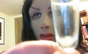 masked cd pours cum on lips from glass