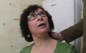 Busty Granny in Stockings and Glasses Fucks