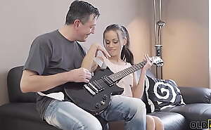 OLD4K. Elderly guitarist and adorable Euro brunette have sex on rub-down the love-seat